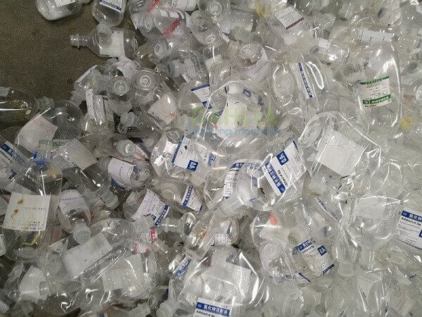 Medical plastic infusion bottle rubber separation